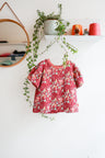 Organic cotton puffed sleeve kids top.
