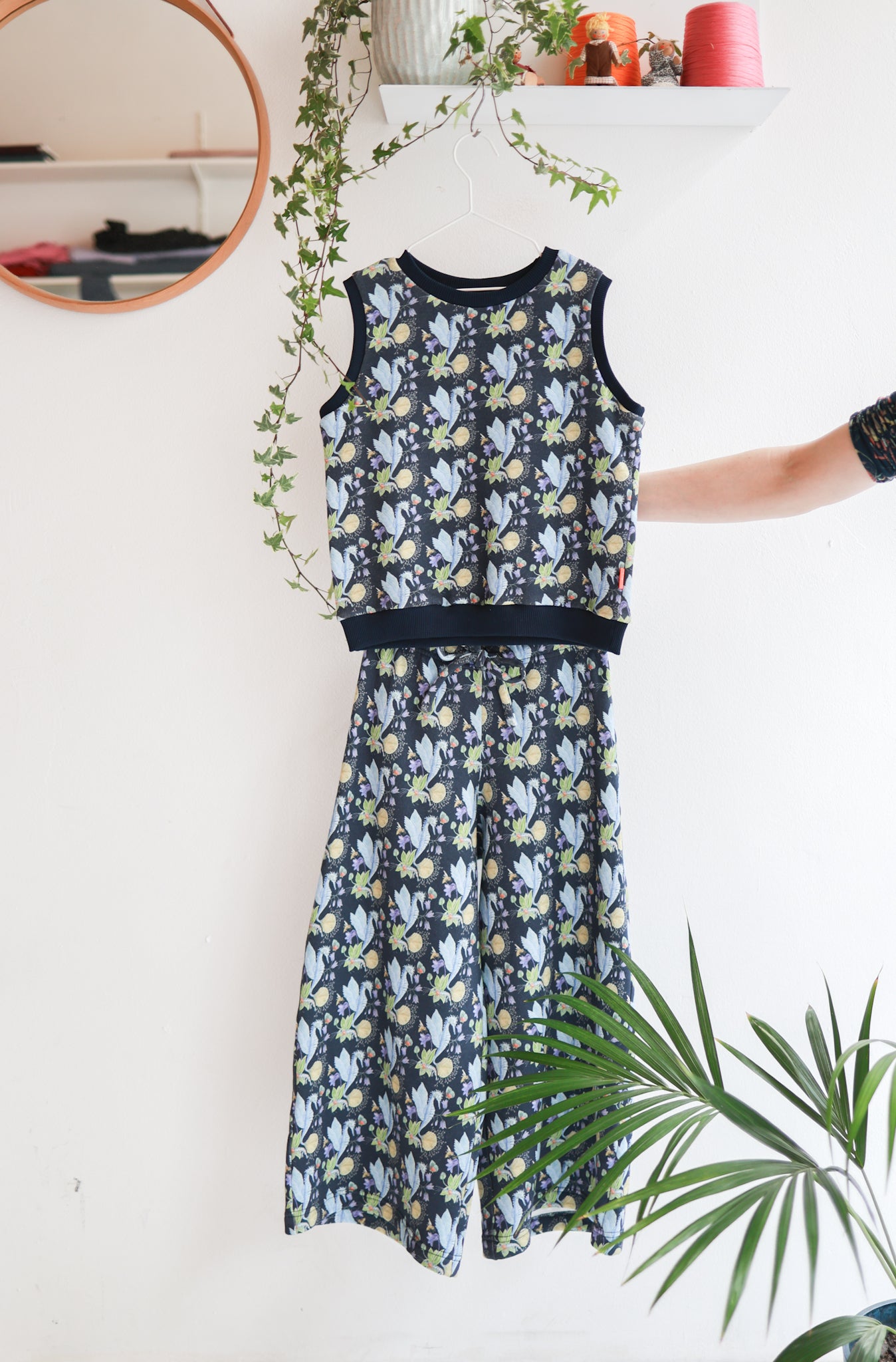 Kids organic cotton extra wide pants and sweater vest.