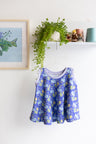 Kids organic cotton flared sweater vest.