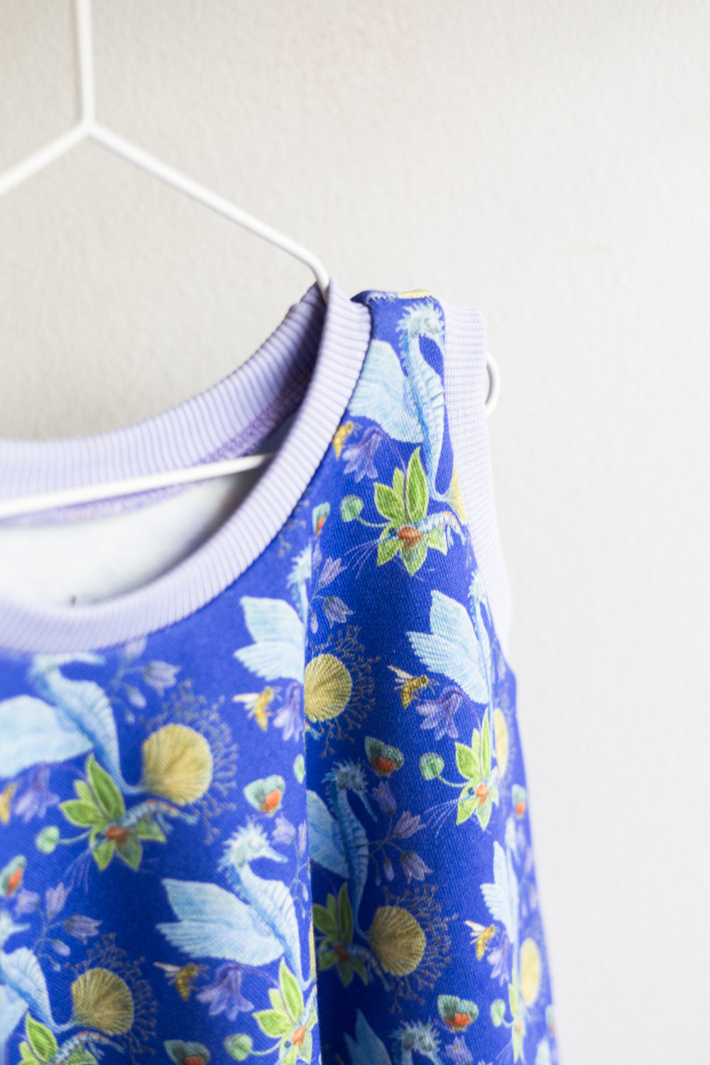 Kids organic cotton flared sweater vest.