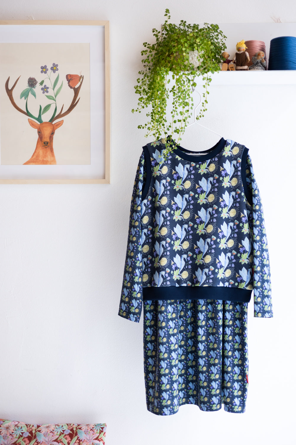 Kids organic cotton sweater vest and slip dress.