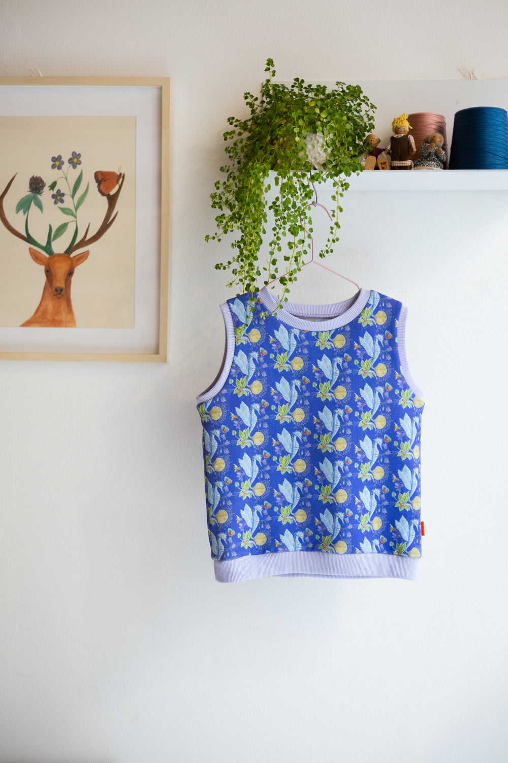 Kids organic cotton sweater vest.