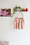 Kids organic cotton flared sweater vest.