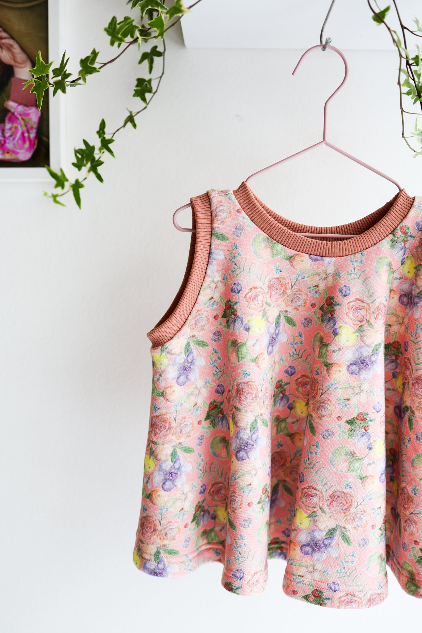 Kids organic cotton flared sweater vest.