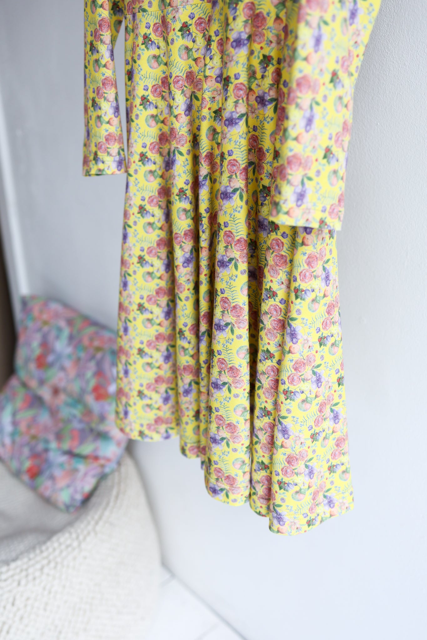 Kids long sleeve extra flared slip dress.