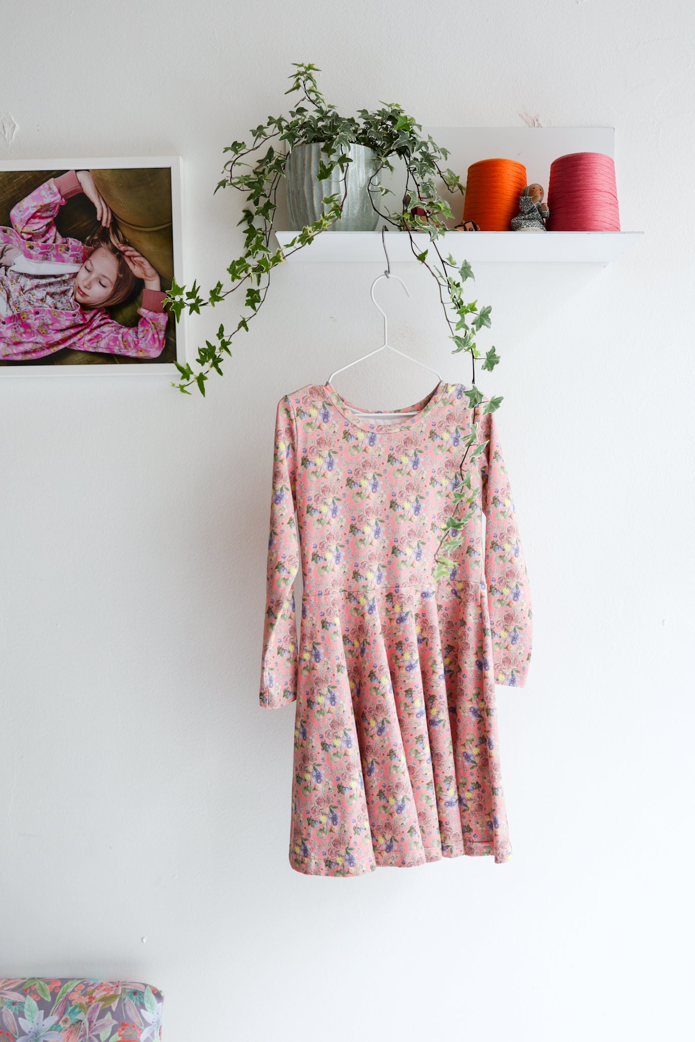 Kids long sleeve extra flared slip dress.