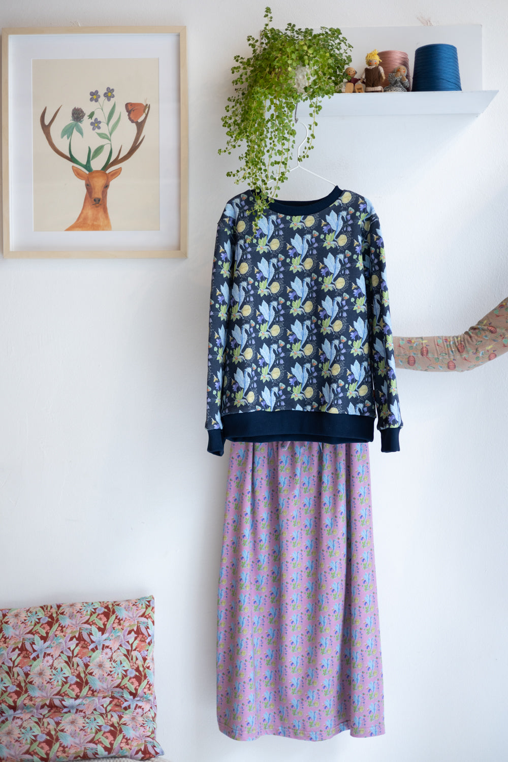 Kids unisex organic cotton sweatshirt and jersey skirt.