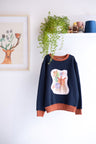 Kids unisex organic cotton sweatshirt.