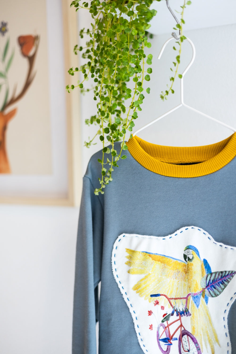 Kids unisex organic cotton sweatshirt.