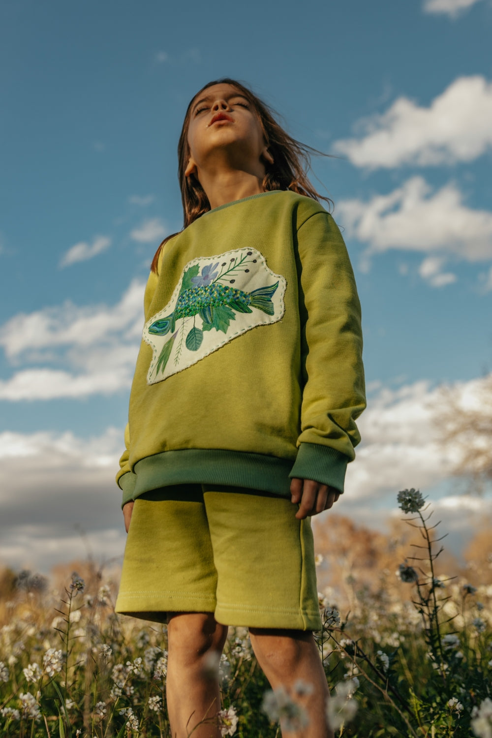 Kids unisex organic cotton sweatshirt and shorts.