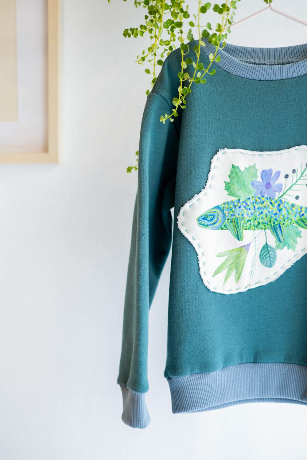 Kids unisex organic cotton sweatshirt.