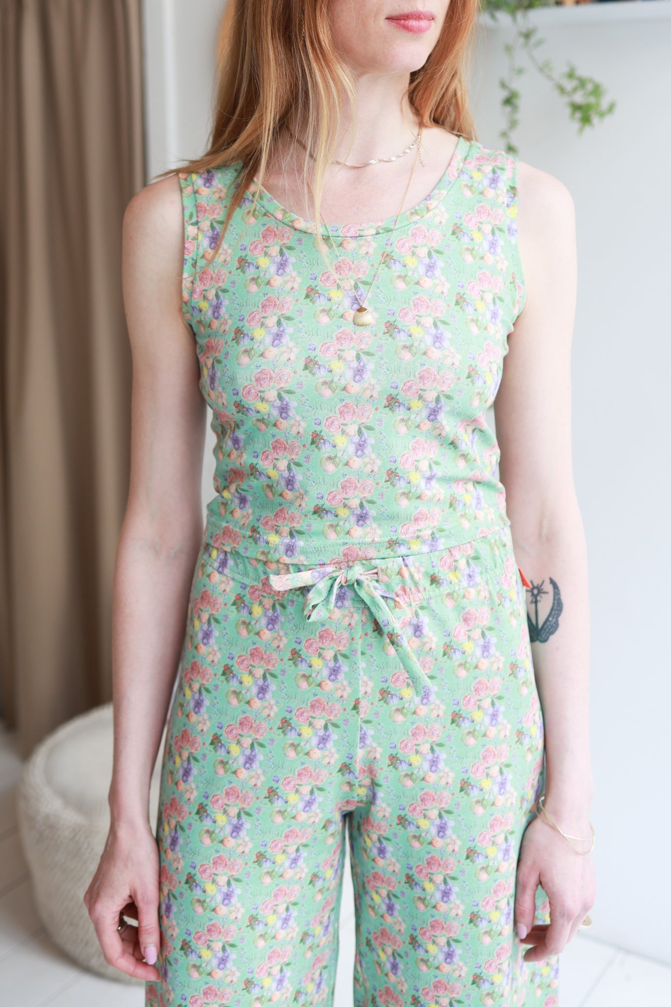 Women organic cotton stretch jersey tank top and high waisted pants.