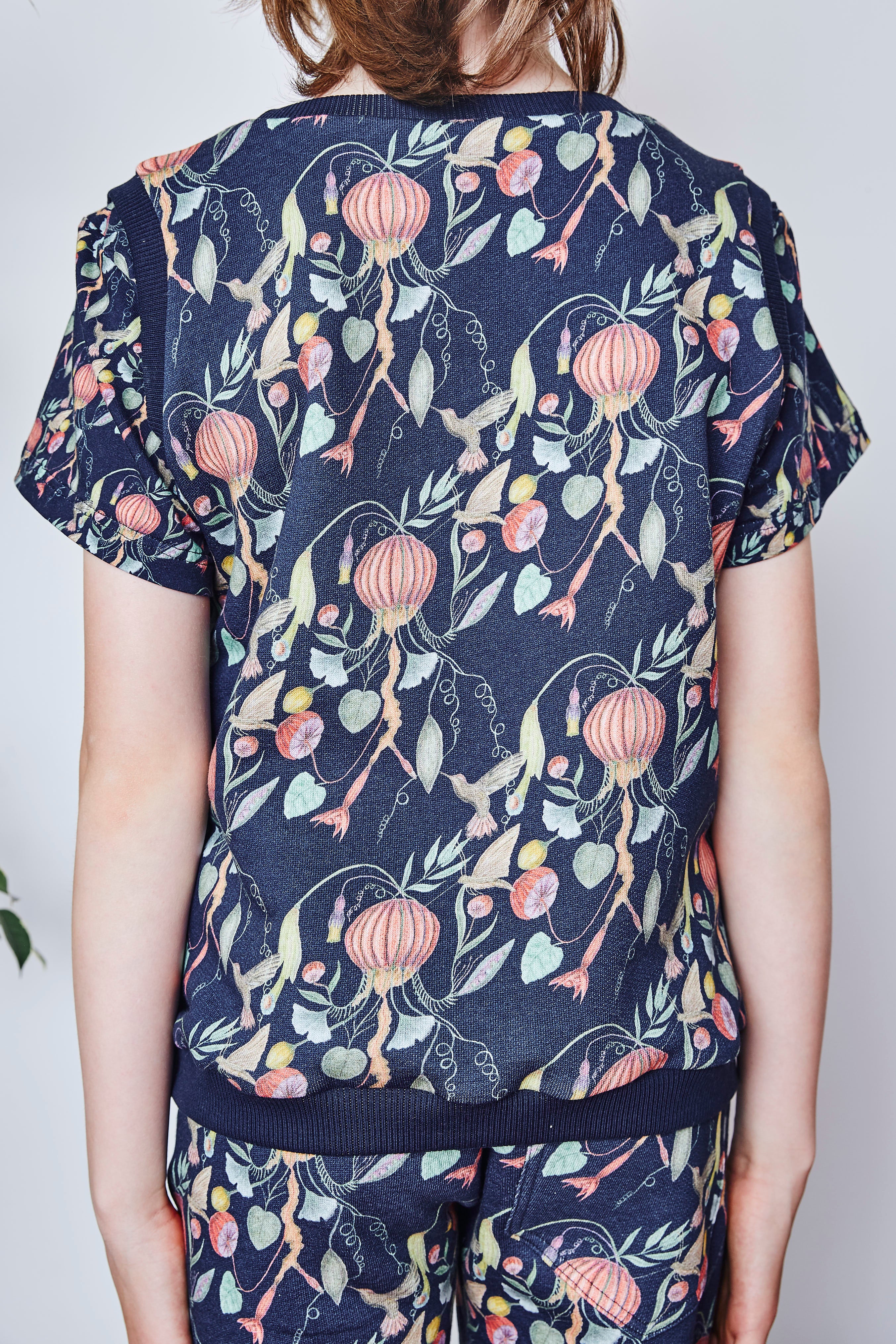 Kids organic cotton sweater vest.