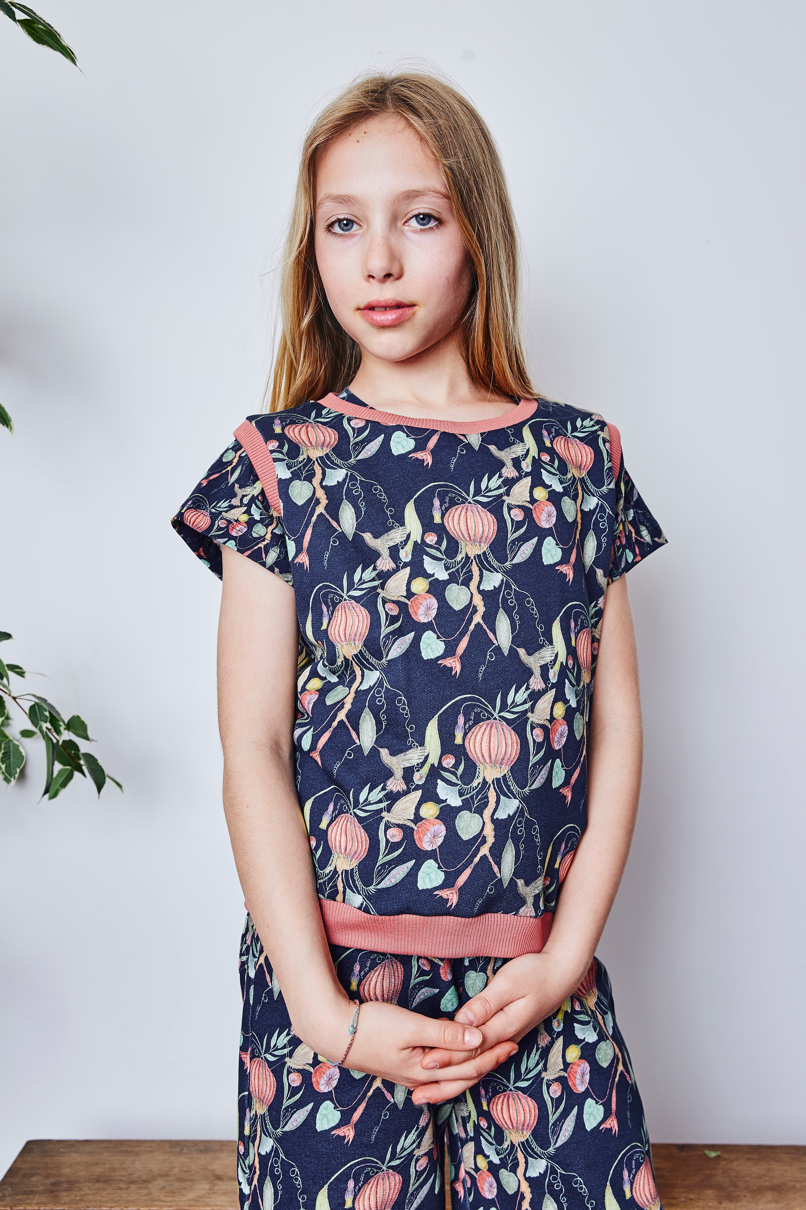 Kids organic cotton sweater vest.