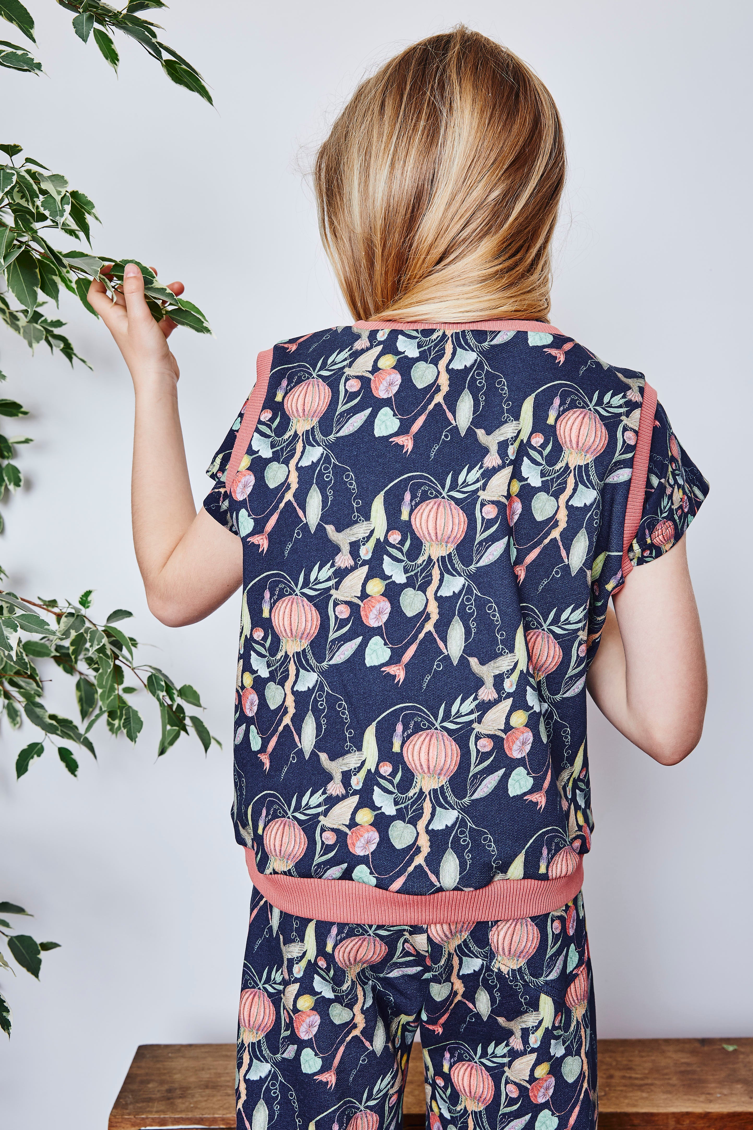 Kids organic cotton sweater vest.