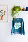 Kids unisex organic cotton sweatshirt.