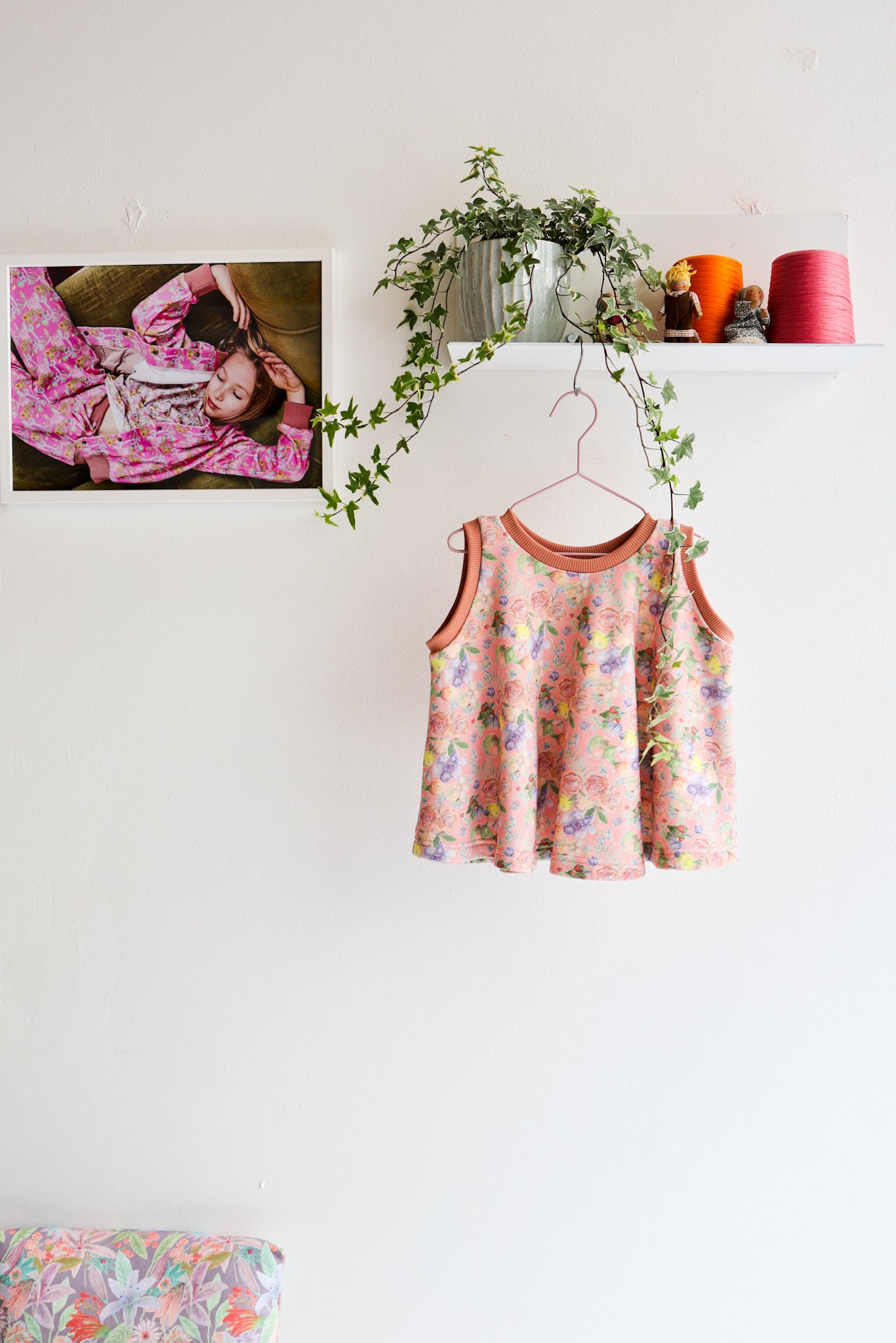 Kids organic cotton flared sweater vest.