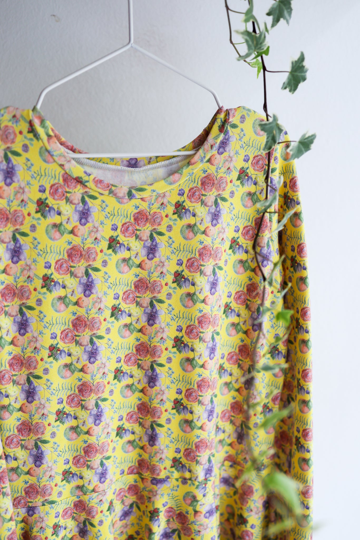 Kids long sleeve extra flared slip dress.