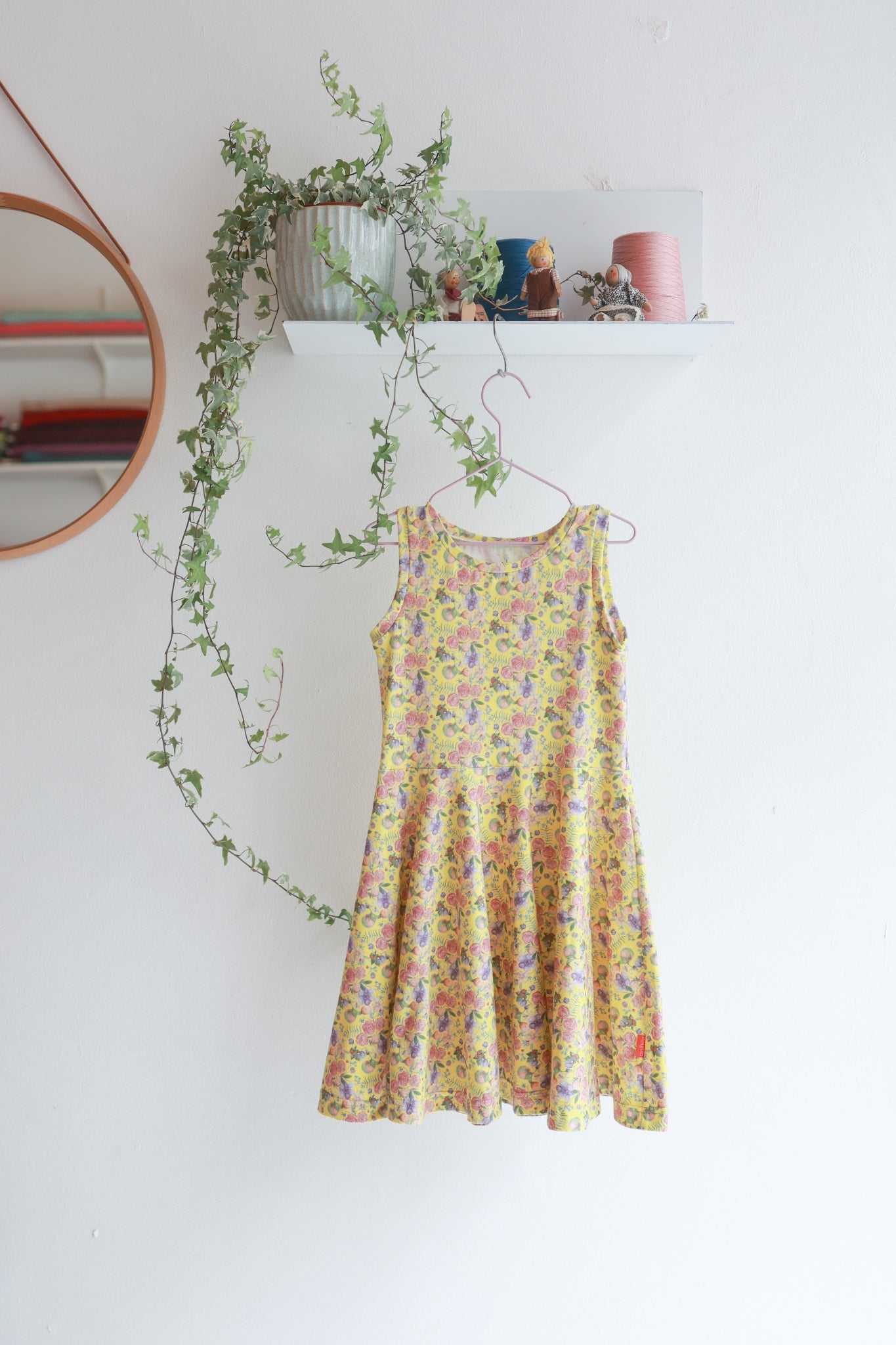 Kids sleeveless extra flared slip dress.