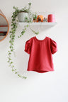 Organic cotton puffed sleeve kids top.