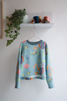 Kids organic cotton slitted sweatshirt.