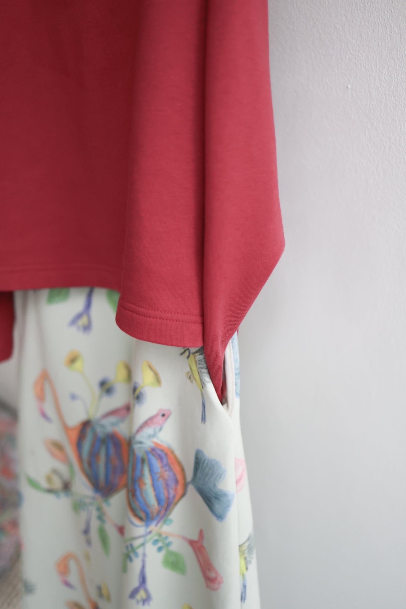 Kids organic cotton slitted sweatshirt and flared skirt.