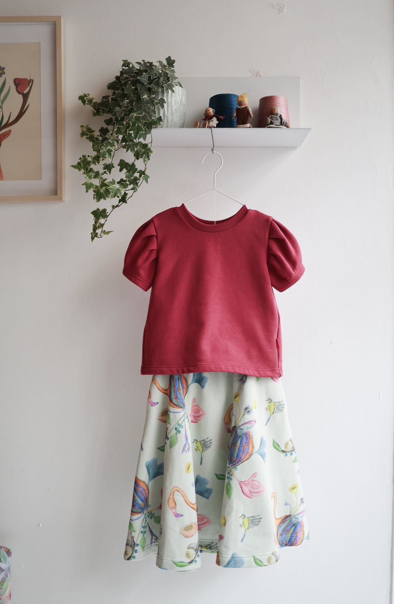 Kids organic cotton sweat flared skirt and puffed sleeve top.