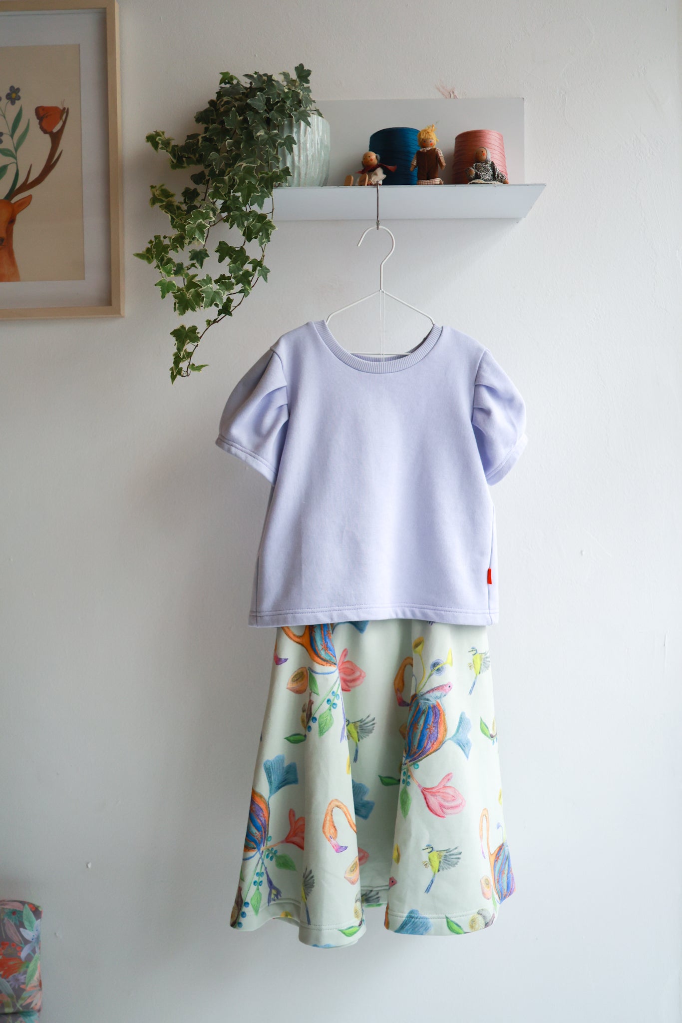 Kids organic cotton sweat flared skirt and puffed sleeve top.