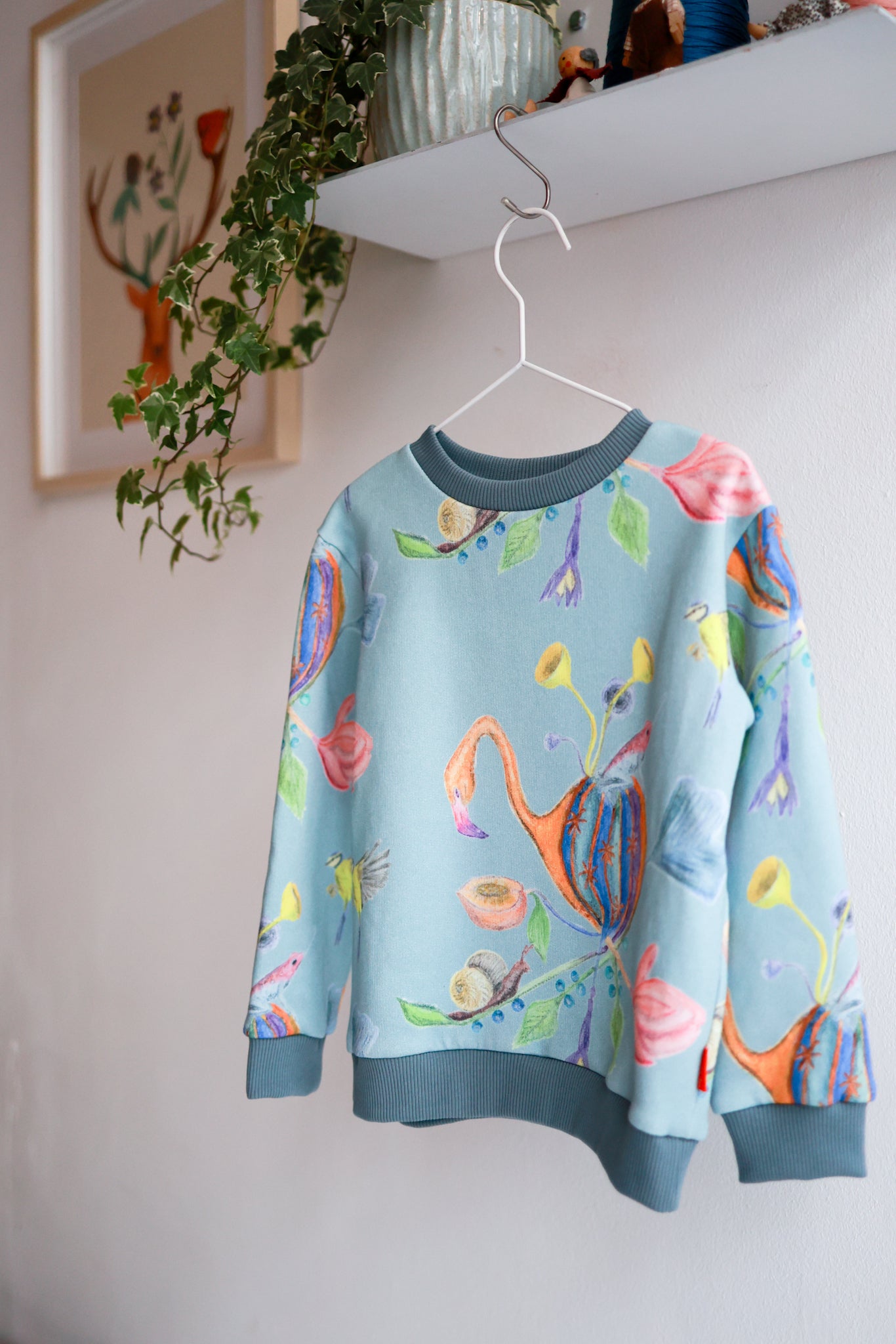 Kids unisex organic cotton sweatshirt.