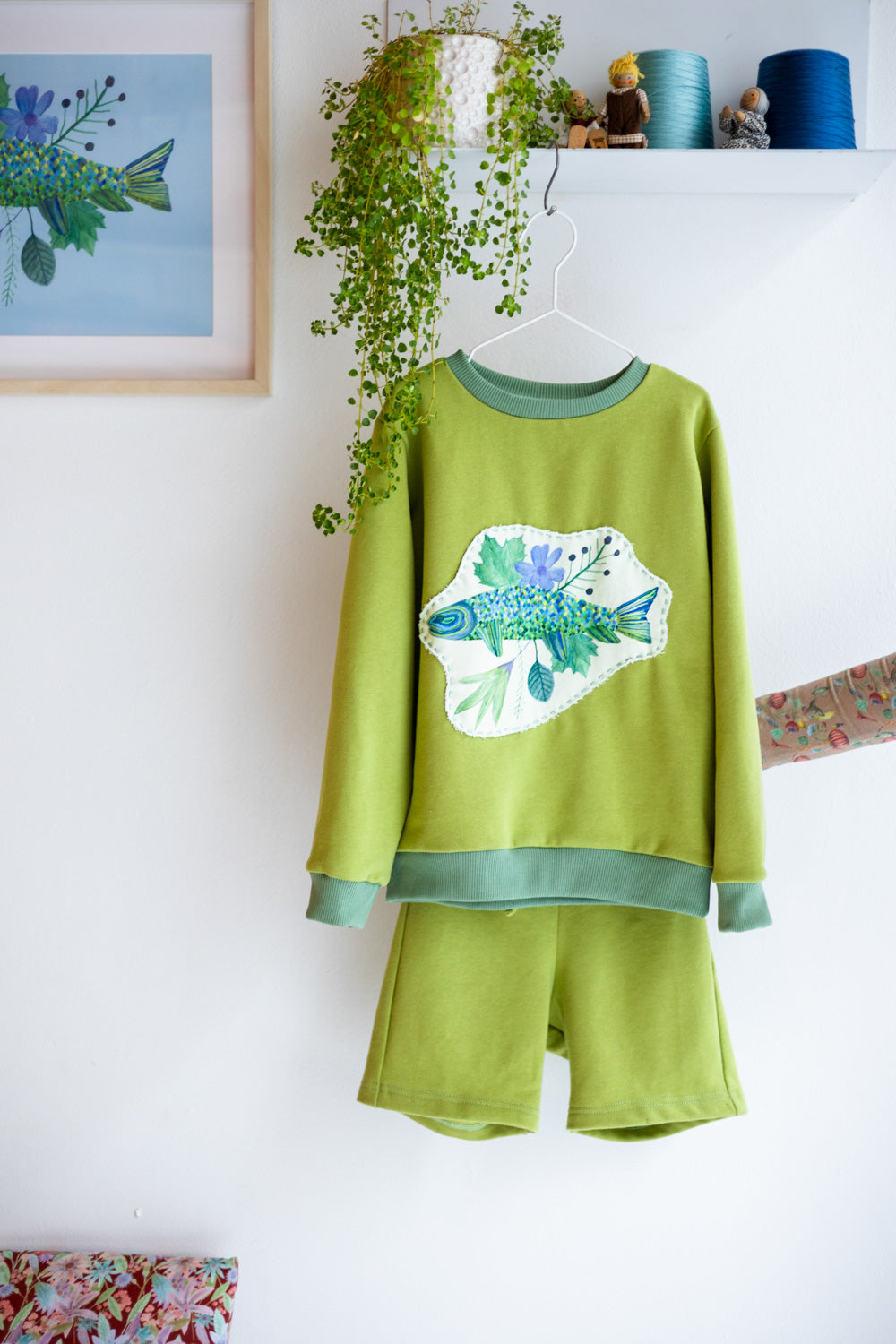 Kids unisex organic cotton sweatshirt and shorts.