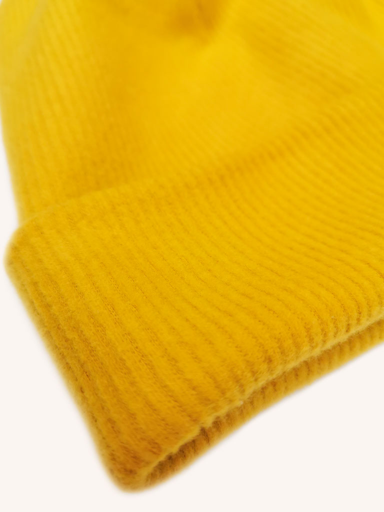 "Dreaming Softly" organic cotton beanie by aesthete kidswear. Color: Golden yellow.