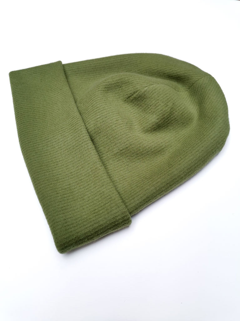 "Dreaming Softly" organic cotton beanie by aesthete kidswear. Color: Green woods.