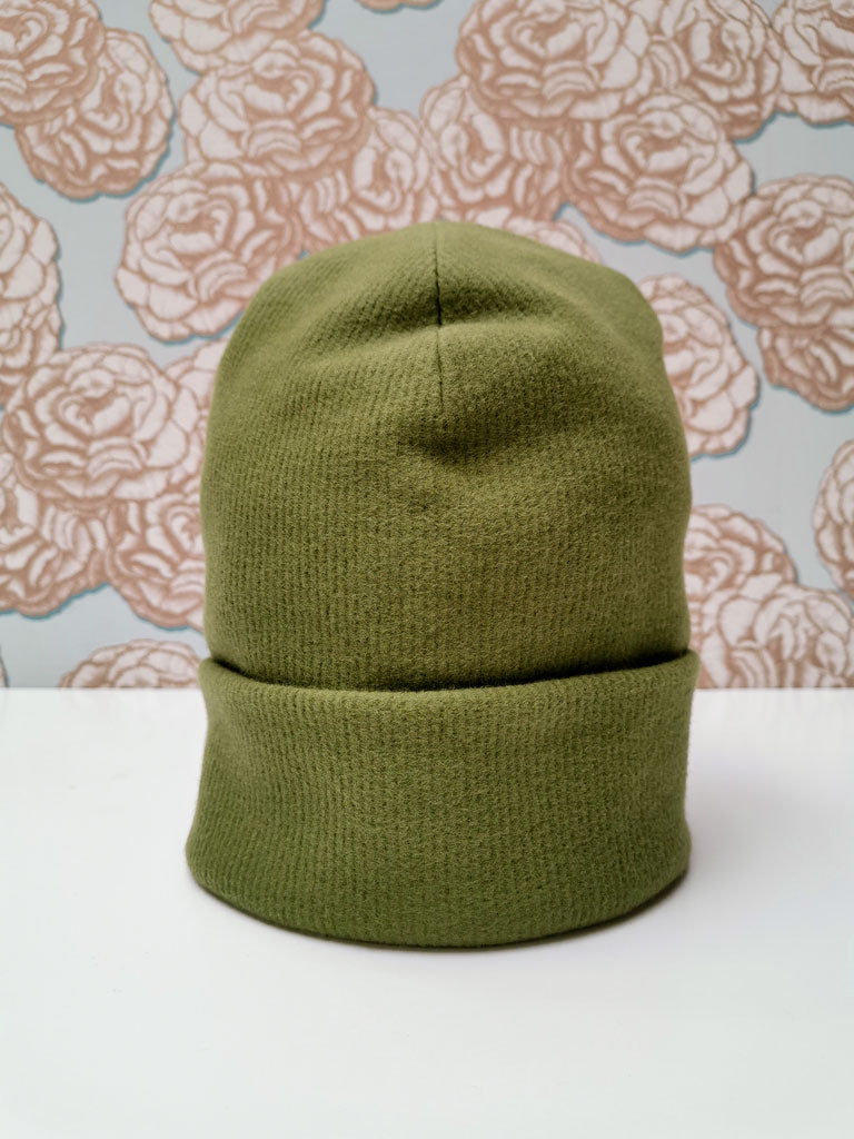 "Dreaming Softly" organic cotton beanie by aesthete kidswear. Color: Green woods.