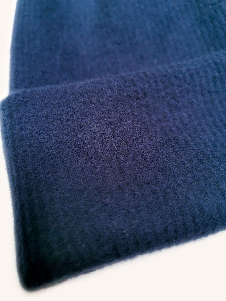 "Dreaming Softly" organic cotton beanie by aesthete kidswear. Color: Navy blue.